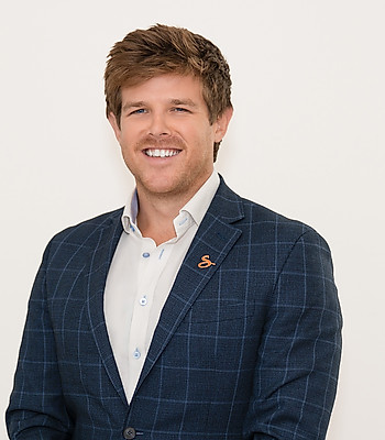 Portrait of Tyler Marrin, VP of Marketing.