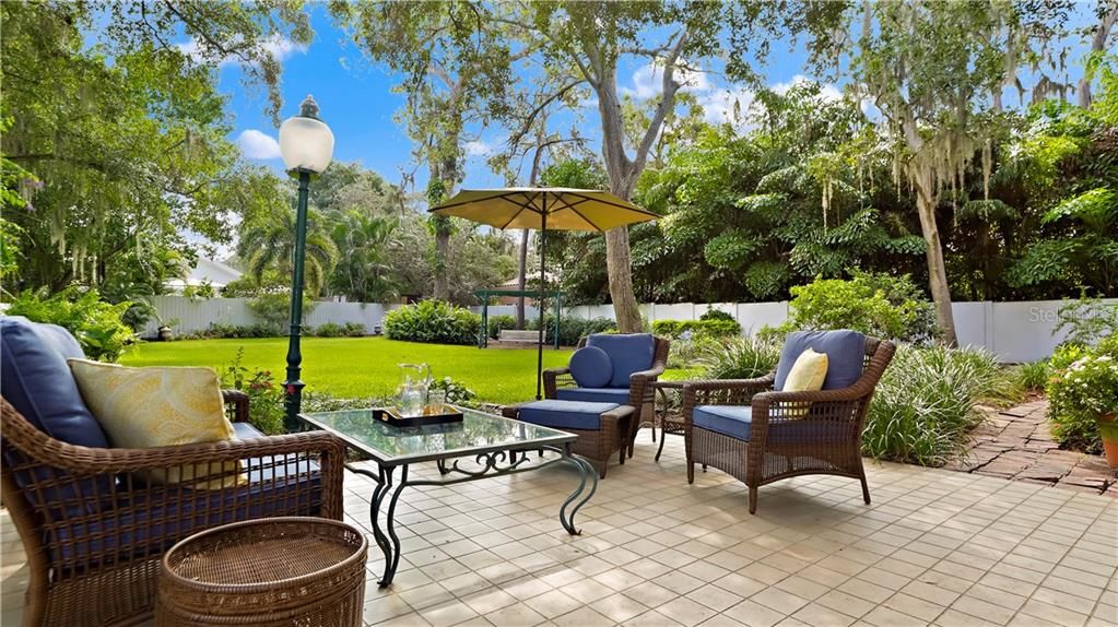 back yard seating and luxurious garden in tampa