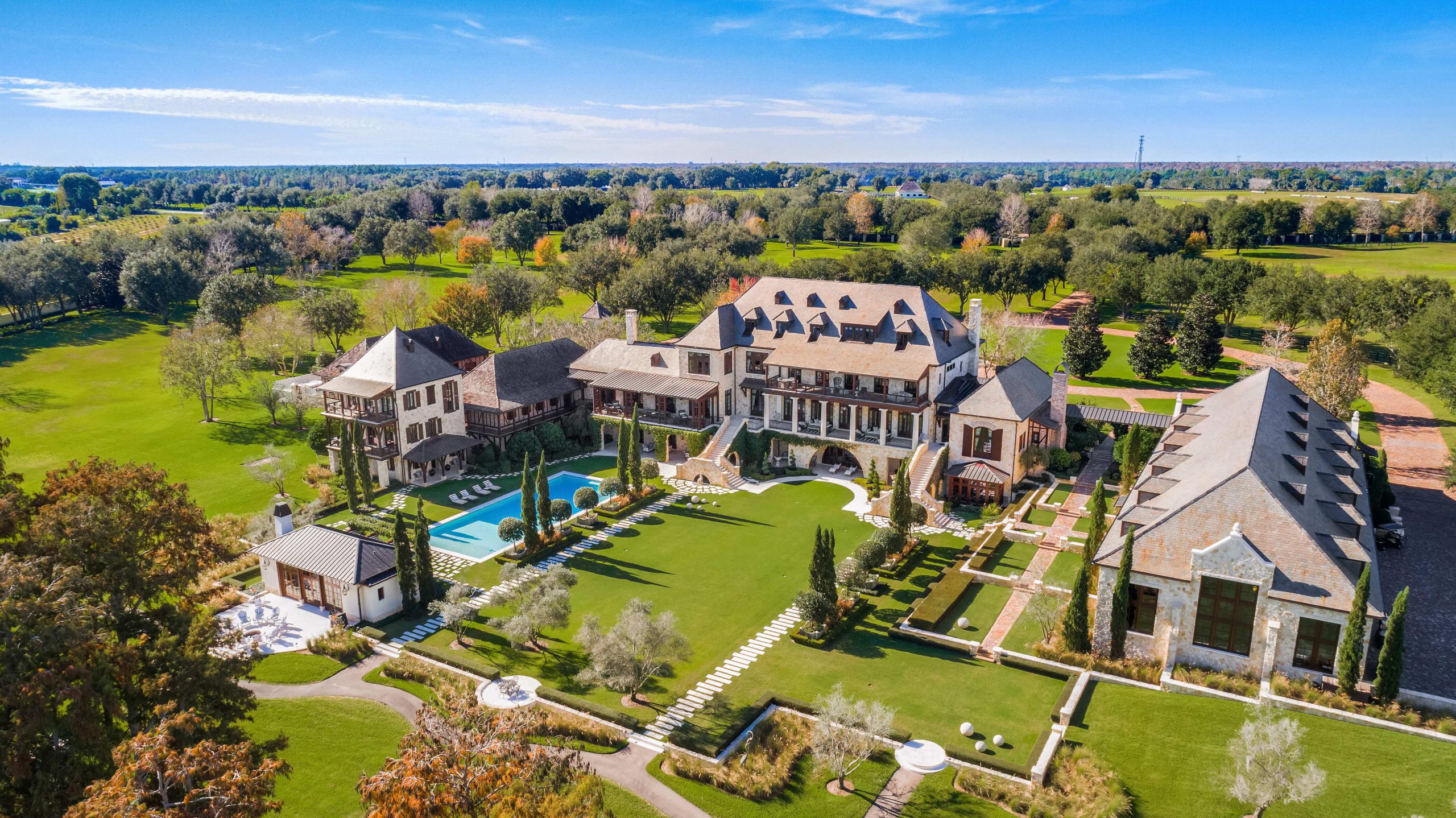 areal view of the oaks estate and backyard